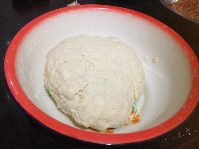 Pour the flour into the pot and add yeast powder mixed with water and stir into bright and not sticky soft dough. Cover and let the dough for 90 minutes fermenting at 30 degrees.